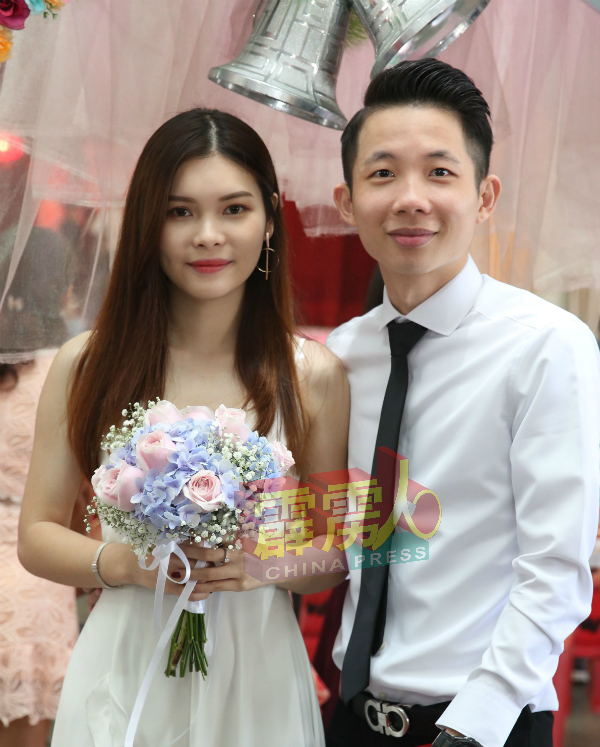 王振权与张佩琪。