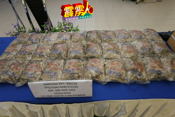 警方本月10日在车内起获的海洛因,重约20公斤,市价超过26万令吉。