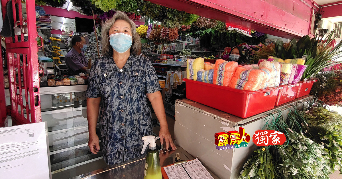 郑美华指整个江沙街上都没有新春气氛。