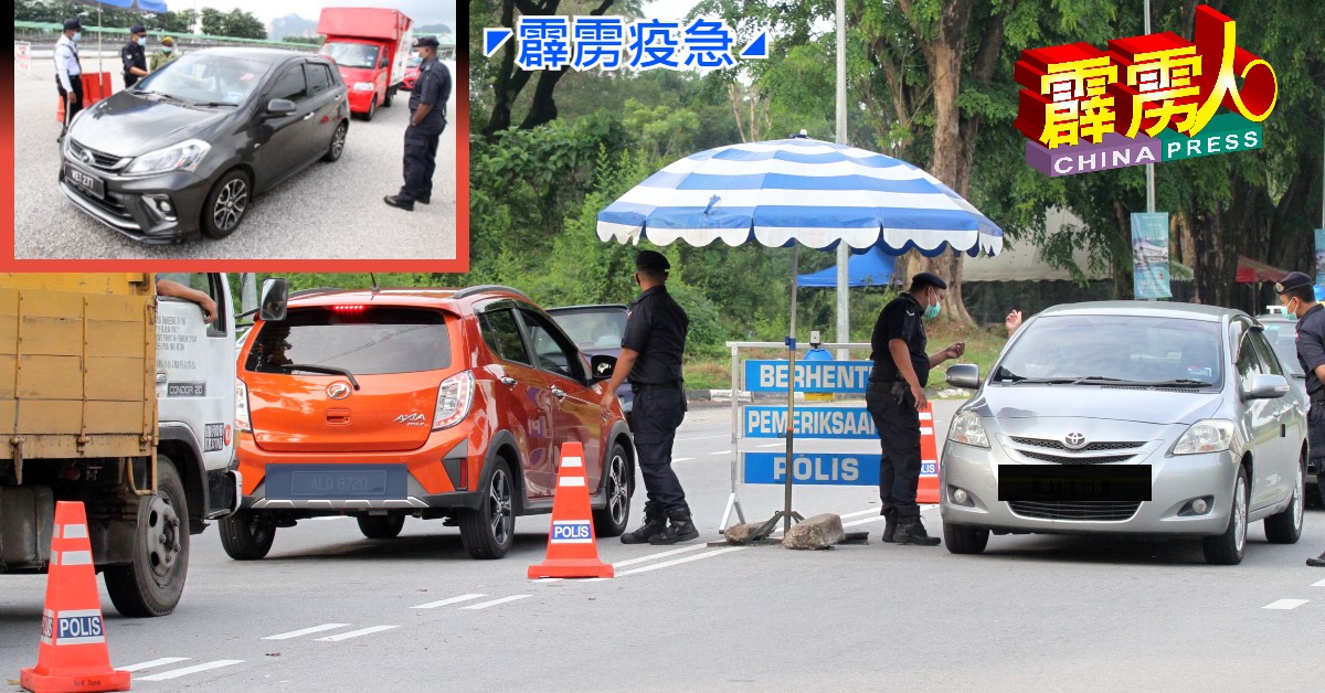 怡保警方在拿乞路设双向路障，不论市民欲进入怡保市区或前往华都牙也，都需要合法文件才能通关。