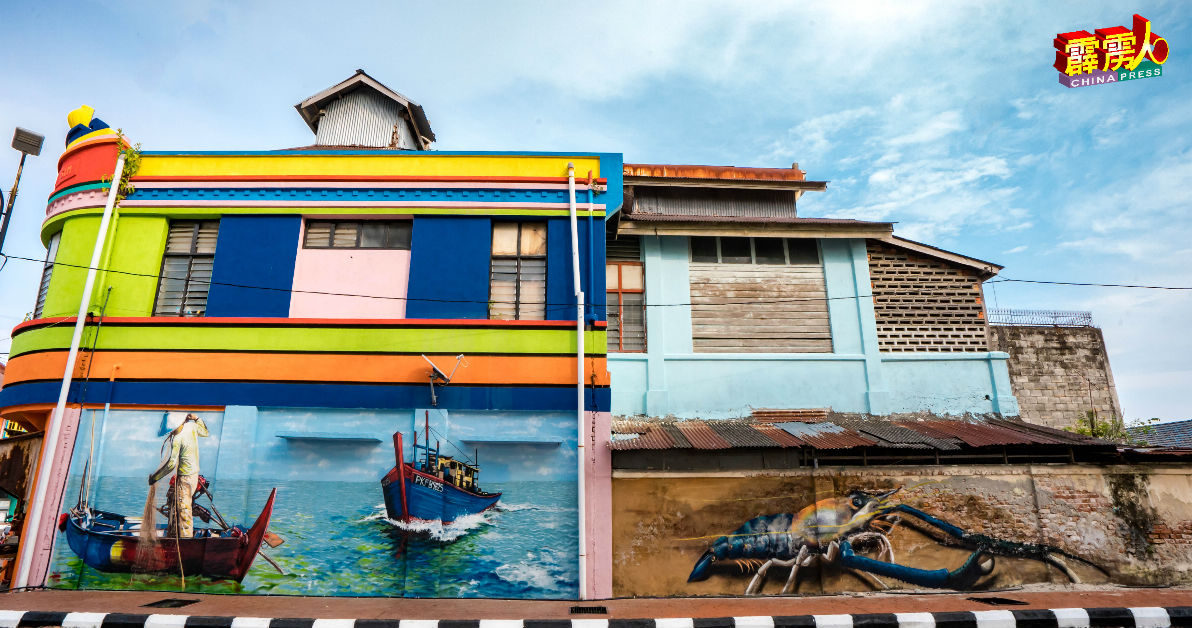 峇眼拿督镇新填多幅大型壁画，尤其突显甘榜与渔村风土人情。（陈志坤摄）
