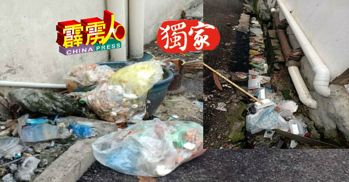 杨嘉森路商店后巷沟渠丟满垃圾，饭盒及塑料袋塞满沟渠。