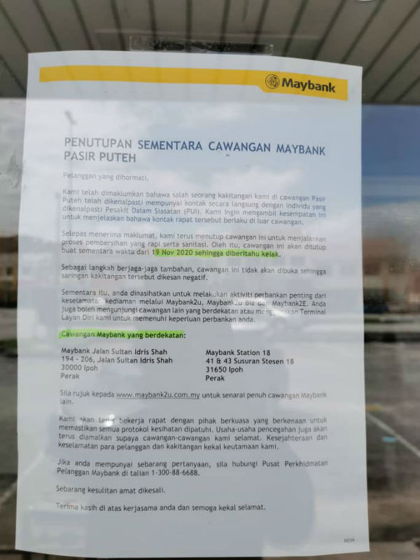 马来亚银行怡保大和园分行张贴告示，指该分行暂时关闭以进行消毒工作。