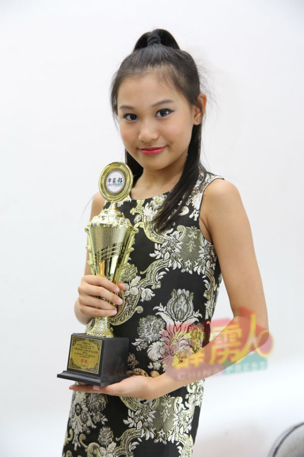 远从槟城大山脚前来的杨凯雯，挑战高难度歌曲《破茧》，让她夺得第3名。