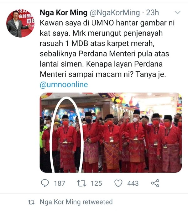 倪可敏于推特指出，来自巫统的朋友发来了一张照片，并发牢骚指一马公司贪污者就站在红地毯上，反观，首相却只是站在石灰地上。