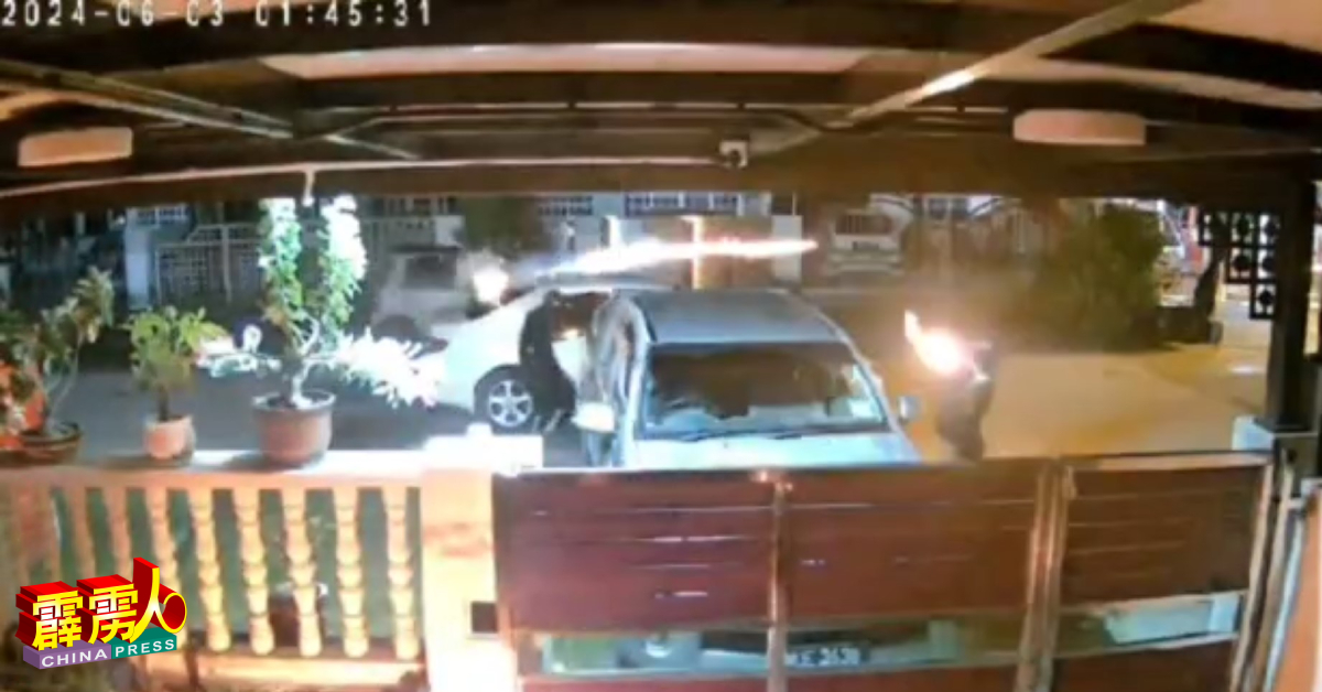 闭路电视摄录数名干案者共乘一辆白色轿车，朝住家抛掷汽油弹。