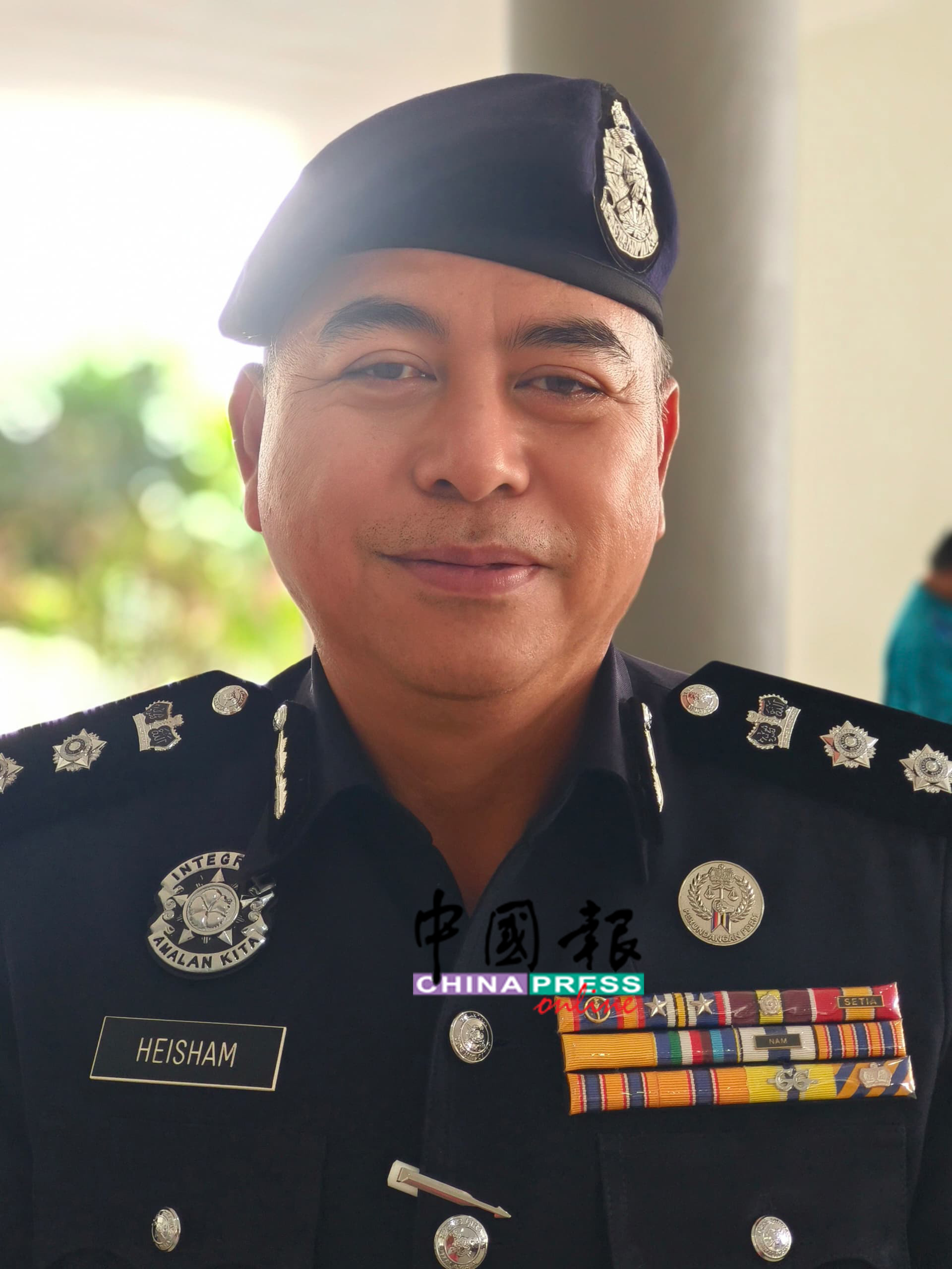 江沙警区主任希山哈仑助理总监
